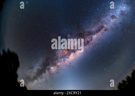 This is a fish-eye view of the centre of the Galaxy region in Sagittarius and Scorpius nearly overhead before dawn on an austral autumn morning in Mar Stock Photo