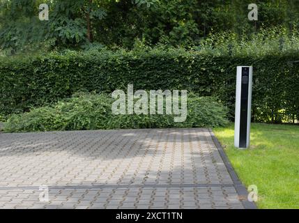 EV Charging Spot with Empty Parking Space Stock Photo