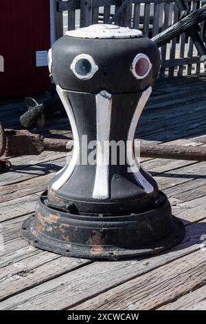 Black and white bollard in Lunenburg, Nova Scotia, Canada Stock Photo