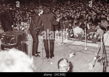 Backstage view of The Beatles performing live at the Blokker auction hall on June 7, 1964 in Blokker, Netherlands. Stock Photo