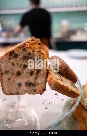 Homemade chocolate chip cake at Pages & Sips, cafe restaurant bookshop with pastry and cake in the old town of Geneve in Switzerland on 21 May 2023. U Stock Photo