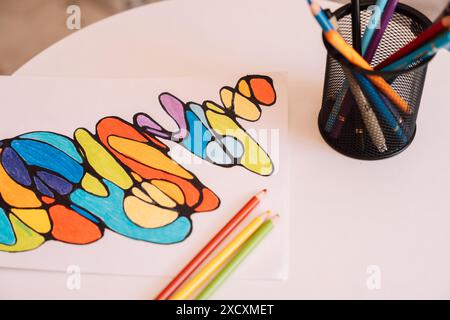 Neurographic drawing colored with colored pencils on white paper Stock Photo