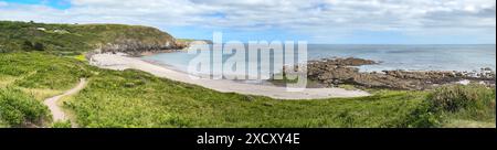 A panoramic view of Kennack Sands looking over the dunes in to the Atlantic Ocean, Cornwall, England. Stock Photo