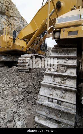 Extracting raw material from quarry for cement manufacturing Stock Photo