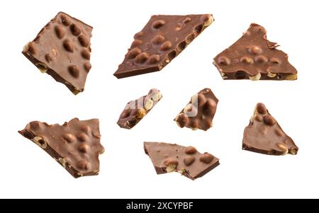 Pieces of hazelnut milk chocolate isolated on white background. Stock Photo