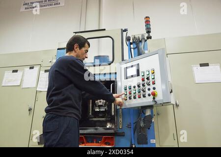 Transfer machining. Machined Indecober. Machining of precision parts in series. Automotive industry. Berriz. Bizkaia. Basque Country. Spain. Stock Photo