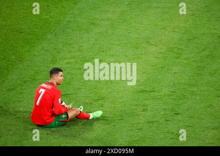 Leipzig, Germany. 18th June, 2024. Soccer: European Championship, Portugal - Czech Republic, preliminary round, Group F, match day 1, Stadion Leipzig. Portugal's Cristiano Ronaldo sits on the pitch. Credit: Jan Woitas/dpa/Alamy Live News Stock Photo