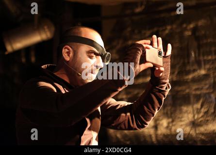 IVANO-FRANKIVSK, UKRAINE - JUNE 18, 2024 - Actor Pavlo Kilnytskyi performs as Polonium in the Hamlet play based on William Shakespeare’s tragedy, directed by People’s Artist of Ukraine, Shevchenko National Prize laureate Rostyslav Derzhypilskyi and staged by the Ivan Franko Ivano-Frankivsk National Academic Drama Theatre during the First Ukrainian Shakespeare Festival, Ivano-Frankivsk, western Ukraine. Stock Photo