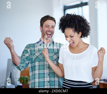 People, creative and cheering for startup celebration, employees and teamwork success for business targets. Goals, good news and collaboration Stock Photo