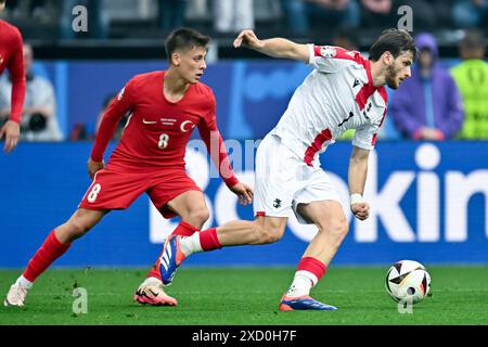 Dortmund - (l-r) Khvicha Kvaratskhelia of Georgie, Arda Guler of ...