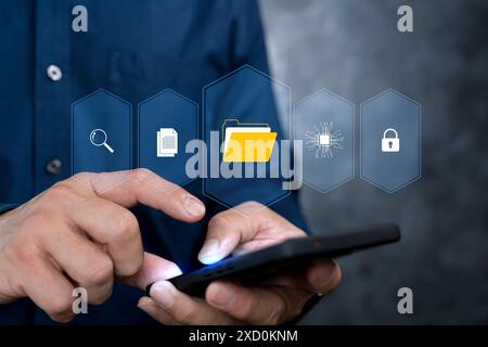 DMS, Document Management System concept, Search and manage document database files online. Businessman using smartphone with file folder icon for onli Stock Photo