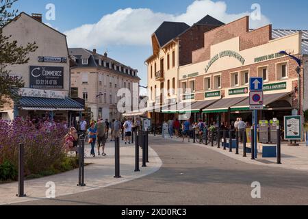 Le Crotoy, France - September 11 2020: The Place Jeanne d'Arc is a busy town square opposite the sea with plenty of seafood restaurants. Stock Photo