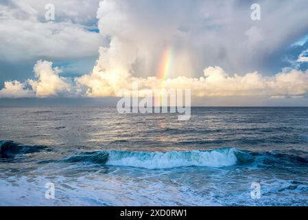 Rainbow forming during a clearing storm. La Jolla, California, USA. Stock Photo