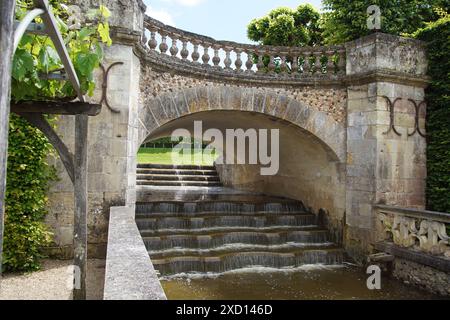 Chateau (Castle) Villandry and gardens. Bridge over flowing water, waterfall. Loire Valley, France. June, summer. Stock Photo