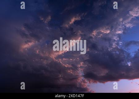 Rain clouds over the evening sky from the mountain top Stock Photo