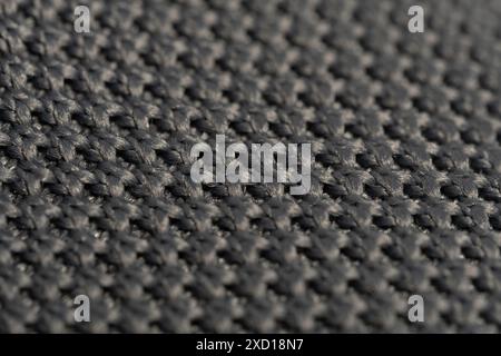 Macro detail made of grey knitted fabric with texture. Abstract background Stock Photo