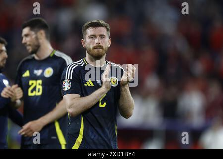 Cologne, Germany. 19th June, 2024. COLOGNE, RheinEnergie Stadium, 19-06-2024, European Football Championship Euro2024, Group stage match no.13 between Scotland and Switzerland. Scotland player Anthony Ralston Credit: Pro Shots/Alamy Live News Stock Photo