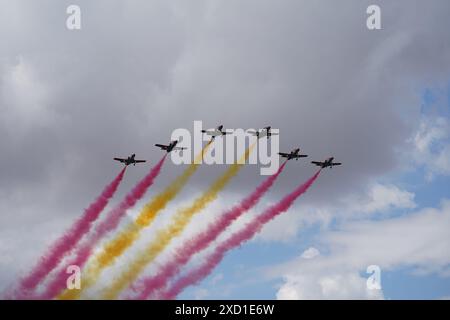 The Spanish Airforce 'Patrulla Aguila' (EaglePatrol) aerobatic team flies over the Royal Palace as King Felipe VI celebrates 10 years as Spain's head Stock Photo