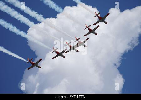 The Spanish Airforce 'Patrulla Aguila' (EaglePatrol) aerobatic team flies over the Royal Palace as King Felipe VI celebrates 10 years as Spain's head Stock Photo