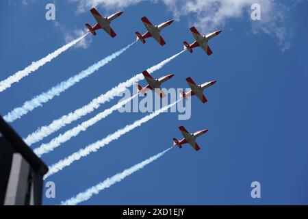 The Spanish Airforce 'Patrulla Aguila' (EaglePatrol) aerobatic team flies over the Royal Palace as King Felipe VI celebrates 10 years as Spain's head Stock Photo