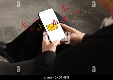 Man using smartphone indoors, closeup. Spam message notification on device screen, illustration Stock Photo