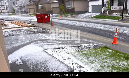 Suburban Neighborhood Covered in Hail After a Storm Stock Photo - Alamy
