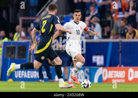 COLOGNE, GERMANY - JUNE 19: Anthony Ralston of Scotland and Granit Xhaka of Switzerland during the Group A - UEFA EURO 2024 match between Scotland and Switzerland at Cologne Stadium on June 19, 2024 in Cologne, Germany. (Photo by Joris Verwijst/BSR Agency) Credit: BSR Agency/Alamy Live News Stock Photo