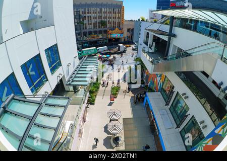Los Angeles, California - April 10, 2024: Busy weekend at the FIGat7th shopping center with the bustling street view. Stock Photo