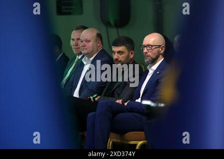 KYIV, UKRAINE - JUNE 19, 2024 - Chairman of the Kyiv Security Forum, Prime Minister of Ukraine in 2014-2016 Arseniy Yatsenyuk, Prime Minister of Ukraine in 2016-2019, chairman of the Interregional Coordination Humanitarian Headquarters Volodymyr Groysman and former Ambassador of Ukraine to the United States, chair of the Board of the Ukraine Crisis Media Center Valerii Chalyi (R to L) attend the special event of the Kyiv Security Forum with G7 Ambassadors to Ukraine to discuss the results of the Summit on Peace in Ukraine and the G7 Summit, Kyiv, capital of Ukraine. Stock Photo