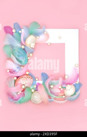 Mother of pearl seashells, feathers and oyster pearls abstract background border on pink. Nature white frame composition with feminine soft concept. Stock Photo
