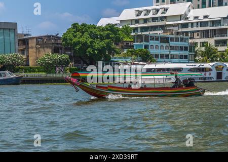 Bangkok, Thailand - March 19th 2018: Long Tail boat on Chao Phraya River. Stock Photo