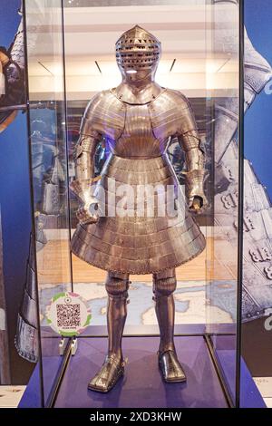 Leeds, UK - 24 Feb 2024: Henry VIII's armor and battle helmet on display at the Royal Armouries Museum, Leeds Stock Photo