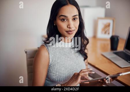 Black woman, happy and portrait with tablet for business, web developer with plan in office. Female designer, mobile tech and smile with research or Stock Photo