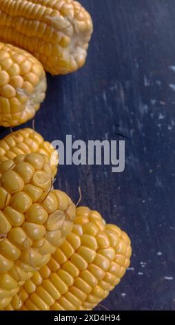 This photo of young sweet corn in yellow on a black background was taken from a close-up, wadaslintang, Indonesia Stock Photo