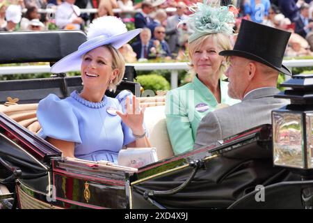 Zara Tindall (left). The Duchess of Richmond and Gordon centre) and Mike Tindall arrive by carriage during day three of Royal Ascot at Ascot Racecourse, Berkshire. Picture date: Thursday June 20, 2024. Stock Photo