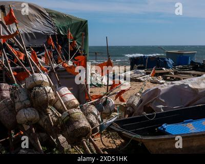 view of traditional old fishing village port with boat,buoys,tents and nets.Praia de Angeiras.Portugal 27.05.2024 Stock Photo