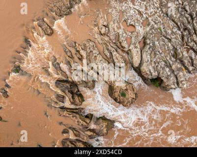 Aerial view of the Tres Salts waterfall (three jumps) of the Llobregat river in Viladordis, on a spring day with cloudy water after some rain (Spain) Stock Photo