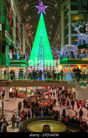 Christmas Tree in the Eaton Centre, Toronto, Canada.Illuminated at night Stock Photo