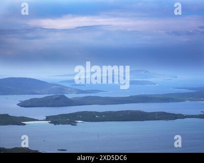 Looking down on Vatersay, Sandray, Pabbay, Mingulay and Berneray from the summit of Heabhal on the Isle of Barra, Outer Hebrides, Scotland, UK. Stock Photo