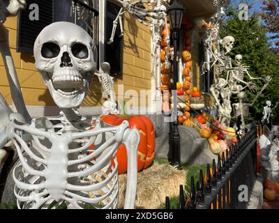 Skeletons and pumpkins decorate a historic home in Salem Massachusetts on an autumn day ahead of the Halloween holiday Stock Photo