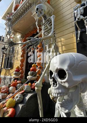 Skeletons and pumpkins decorate a historic home in Salem Massachusetts on an autumn day ahead of the Halloween holiday Stock Photo