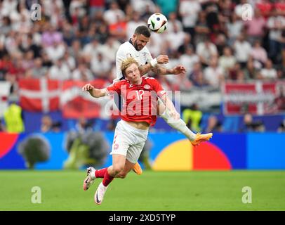 Denmark's Victor Kristiansen (left) and England's Kyle Walker battle ...