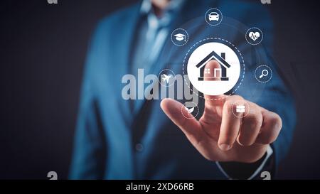 Businessman touching virtual insurance icons. Insurance concept. Stock Photo