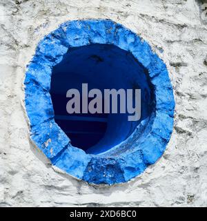 Detail of Exterior of white and blue painted building at Portmeirion italian style village in Gwynedd, North Wales,UK Stock Photo