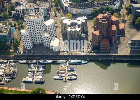 Aerial view, Medienhafen and river Rhine, Marina Düsseldorf Yachthafen, Neuer Zollhof residential complex by architect Frank Gehry, called Gehry build Stock Photo