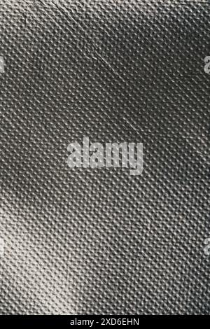 close up of synthetic metallic silver reusable bag fabric Stock Photo
