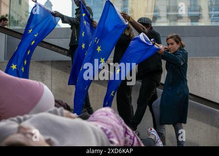 Madrid, Spain. 20th June, 2024.  Civil society organizations and groups have called this afternoon for a rally-performance on the occasion of the International Day of Refugees in the surroundings of the Reina Sofía Museum in Madrid. Credit: D. Canales Carvajal/Alamy Live News Stock Photo