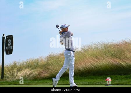 Thursday June 20, 2024: Justin Thomas watches his tee shot on the 18th ...