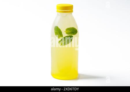 cold drink Melon in a bottle on a white background Stock Photo