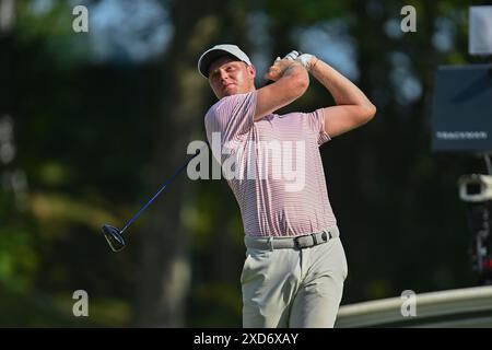 Thursday June 20, 2024: Cam Davis watches his tee shot on the 18th hole ...